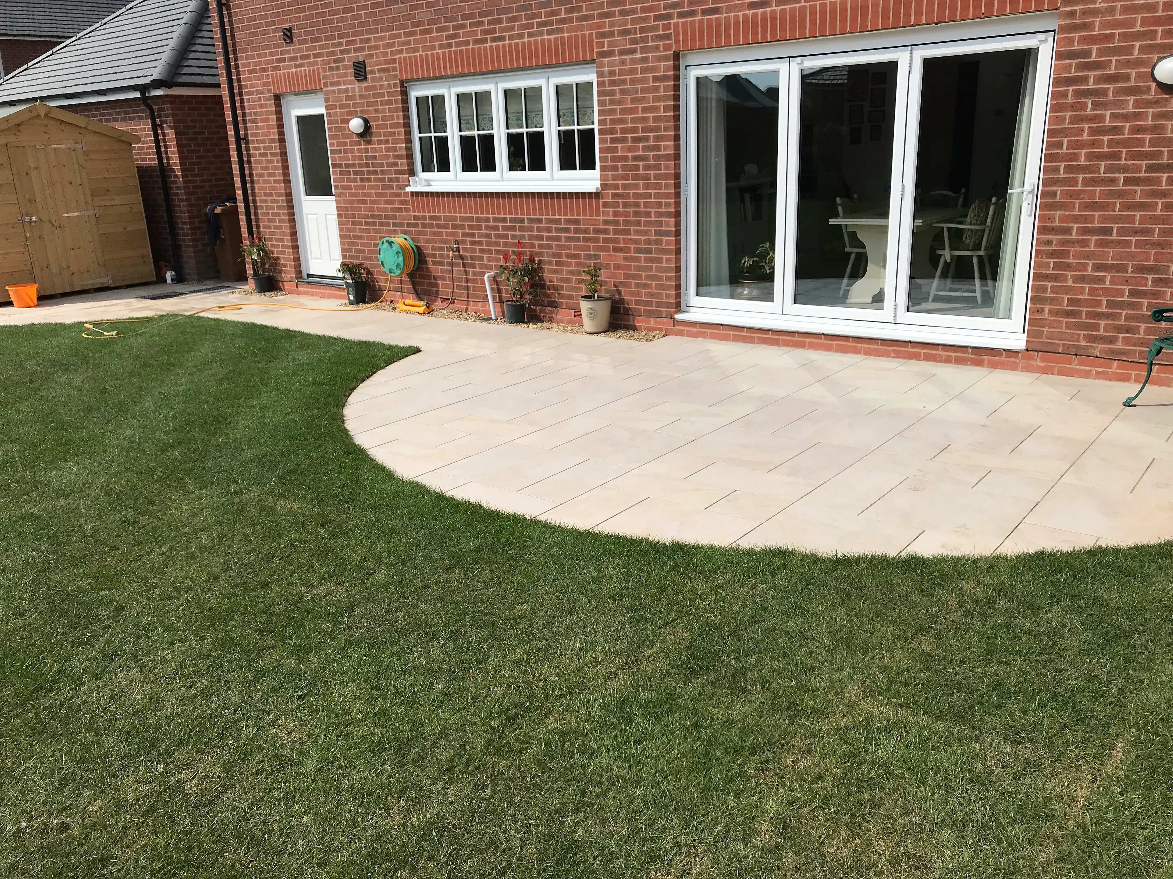 LCS Landscapes & Grounds - Porcelain patio with semi circle theme