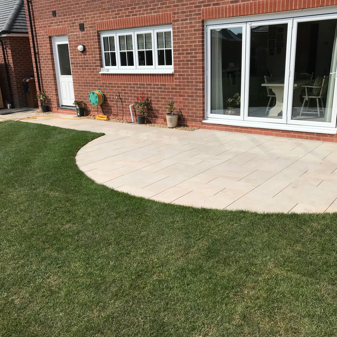 LCS Landscapes & Grounds - Porcelain patio with semi circle theme