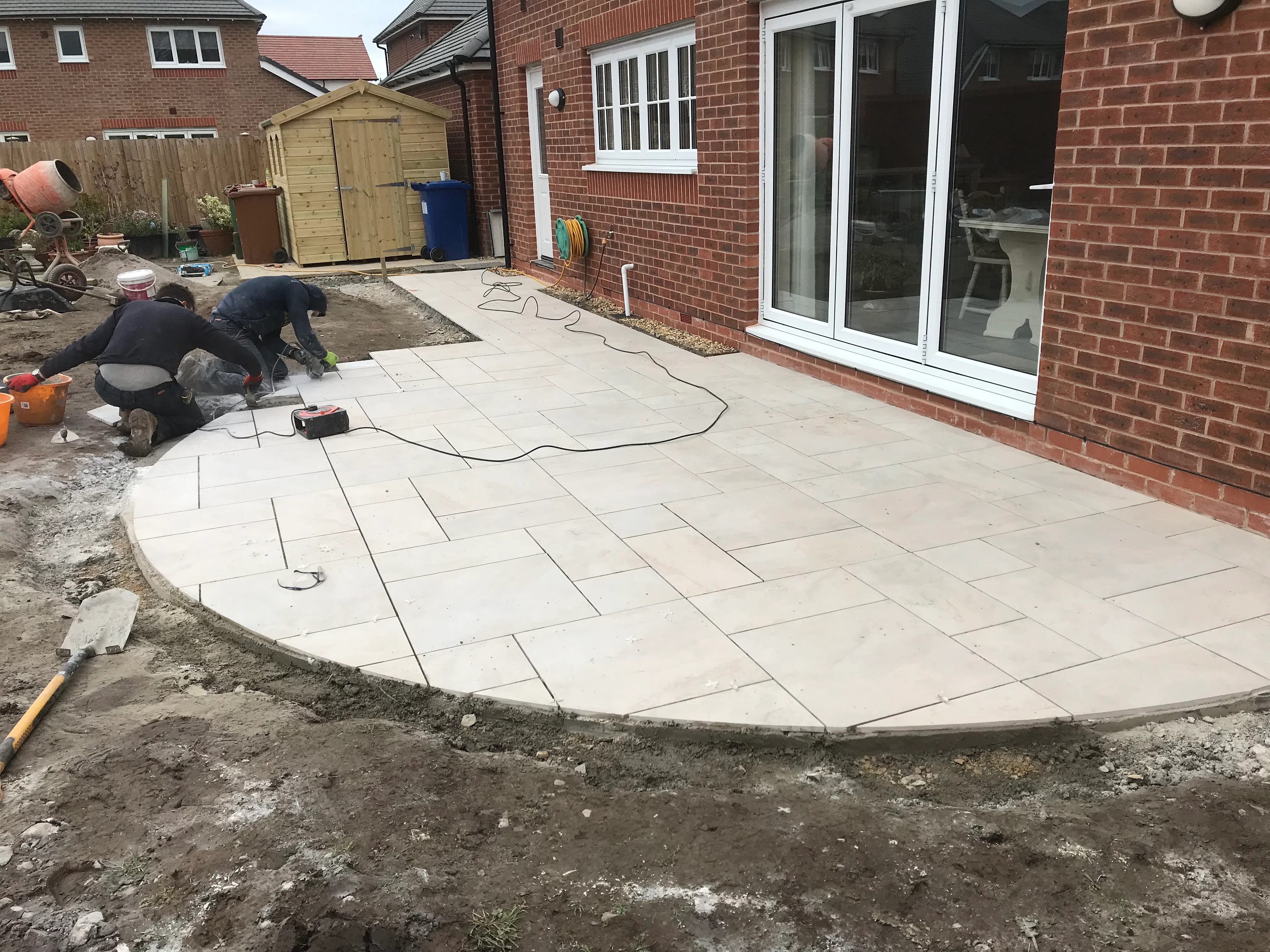 LCS Landscapes & Grounds - Porcelain patio with semi circle
