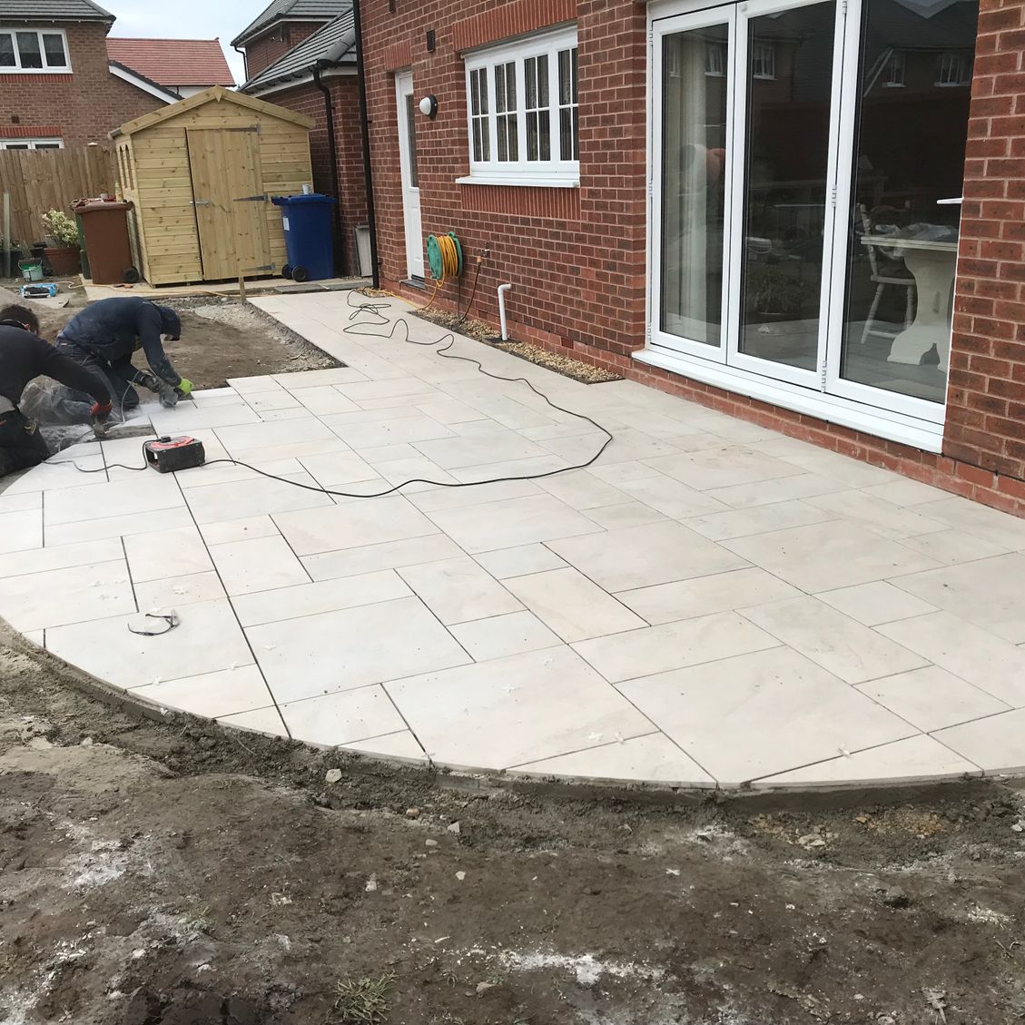 LCS Landscapes & Grounds - Porcelain patio with semi circle